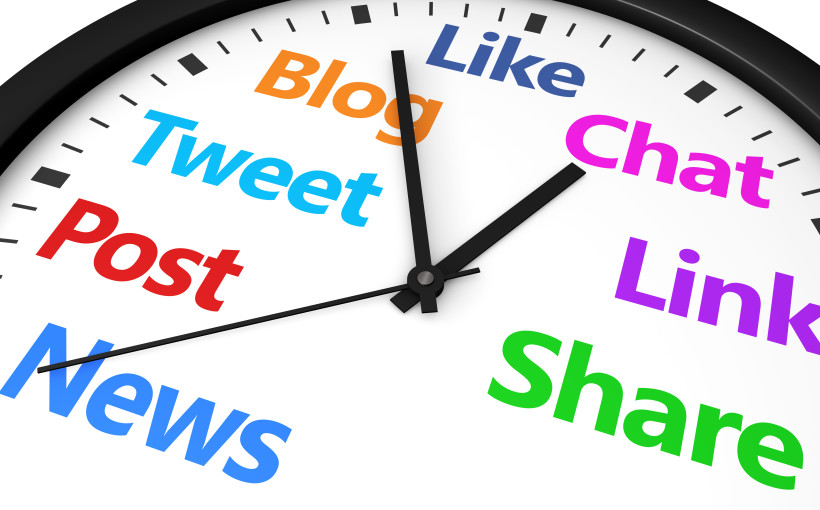 Social media time management and web strategy concept with a clock and social network word and sign printed in multiple colors 3d render image.